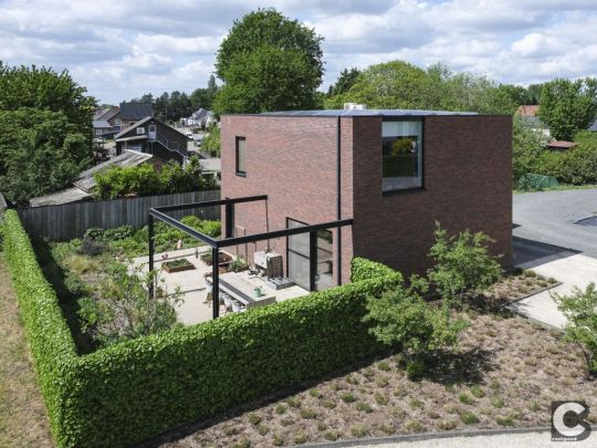 Zolder: energievriendelijke BEN-woning met diverse terrassen, carport en tuinberging op 5a12.